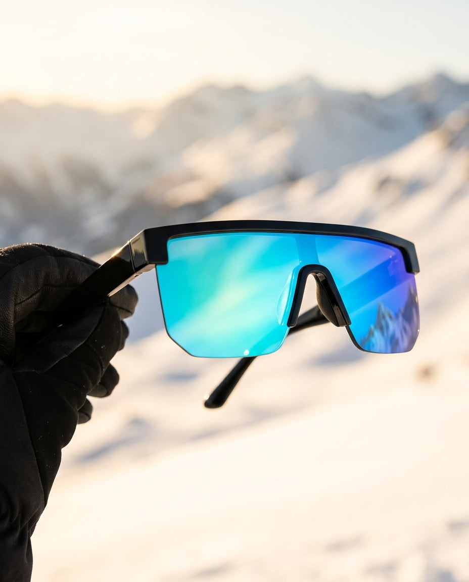 SunFit Ski Jet Blue with a shimmering mirror lens in a ski glove