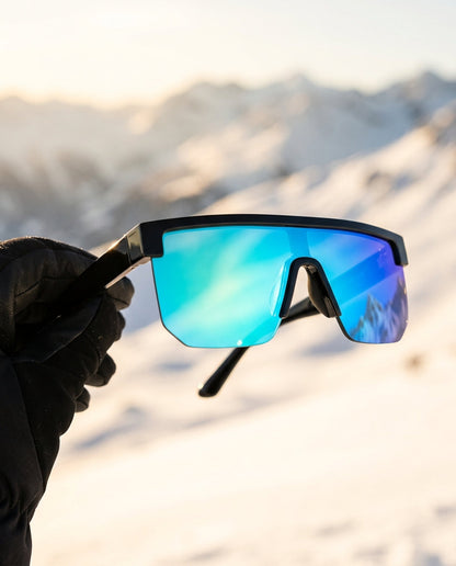 SunFit Ski Jet Blue with a shimmering mirror lens in a ski glove